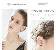 Load image into Gallery viewer, Silver Studs 10 mm Made with Sapphire Crystals From SWAROVSKI(R) Crystal
