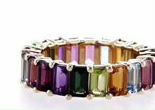 Load and play video in Gallery viewer, RAINBOW EMERALD CUT ETERNITY RING 14K Gold
